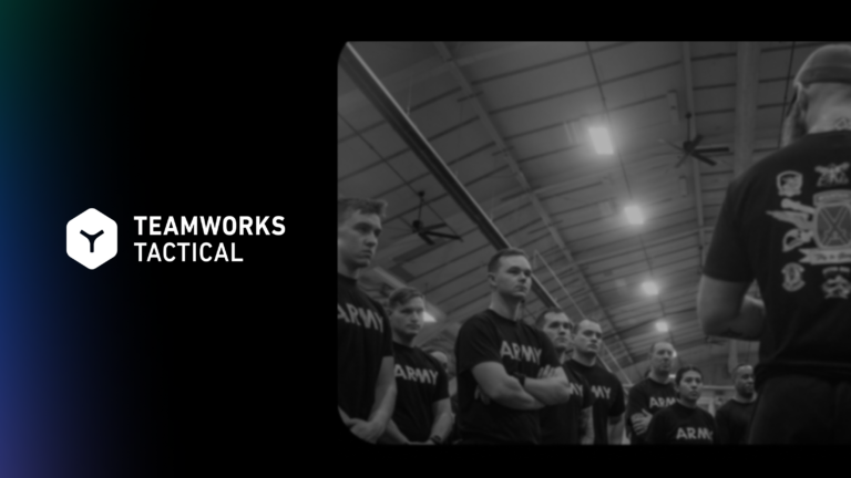A human performance coach briefs a group of Army soldiers in training facility